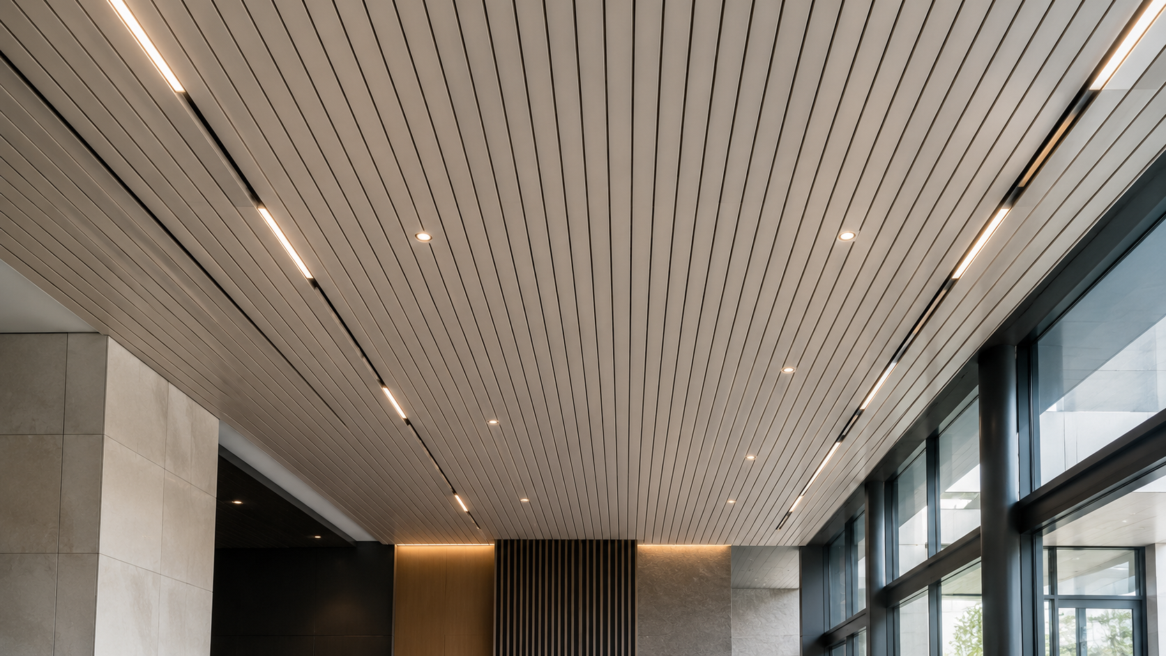 Aluminium strip ceiling installed in a commercial space by Hypro Renovation