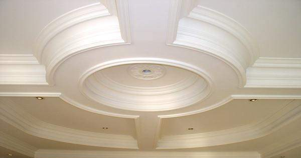 Curved, layered plaster ceiling feature work