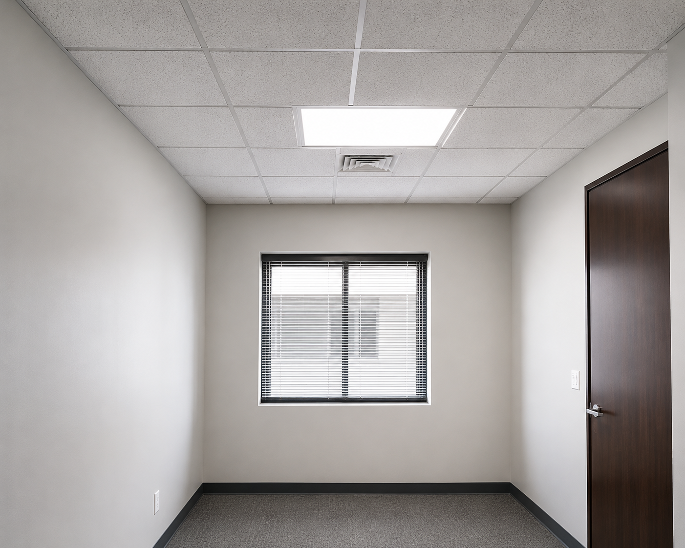 Acoustic ceiling tiles set in a suspended grid