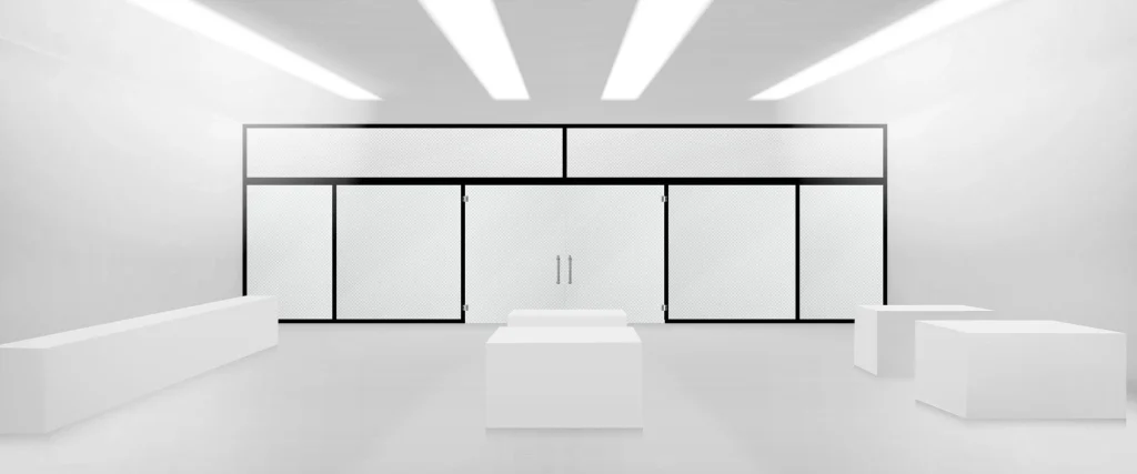 Minimalist white showroom with glass partitions and recessed linear ceiling lighting — Hypro