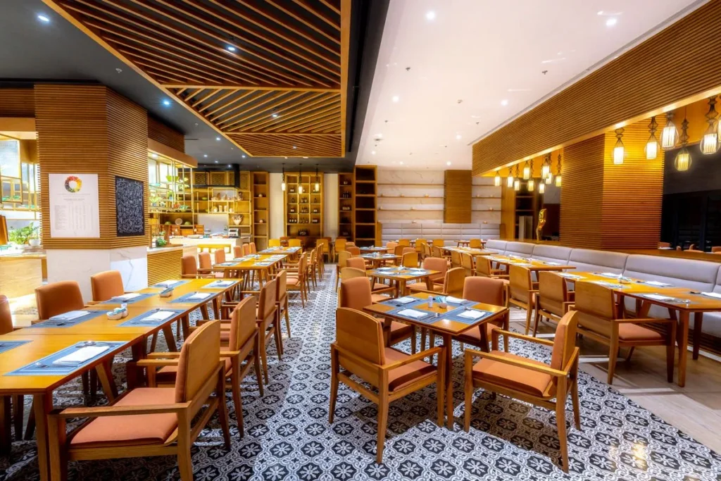 Acoustic ceiling with timber slats over a restaurant dining area