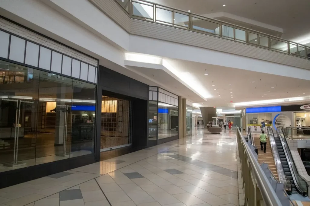 Shopping mall corridor of tenant shopfronts built with drywall partition fit-outs